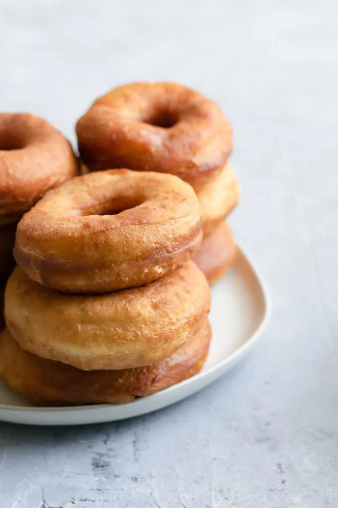 traditional yeasted vegan doughnuts, before being glazed