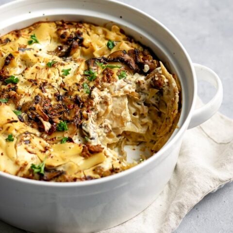 easy vegan mushroom lasagna skillet with a scoop taken out