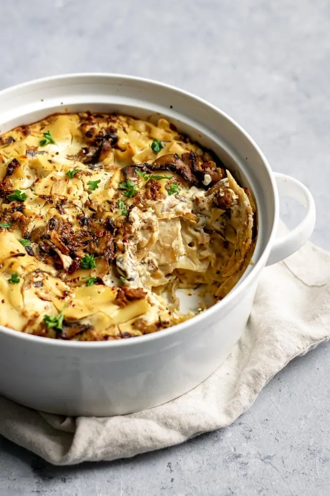 easy vegan mushroom lasagna skillet with a scoop taken out