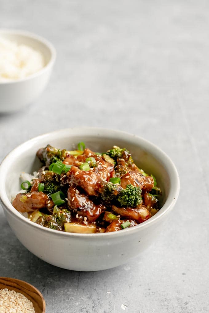 crispy orange seitan and broccoli with jasmine rice, side view