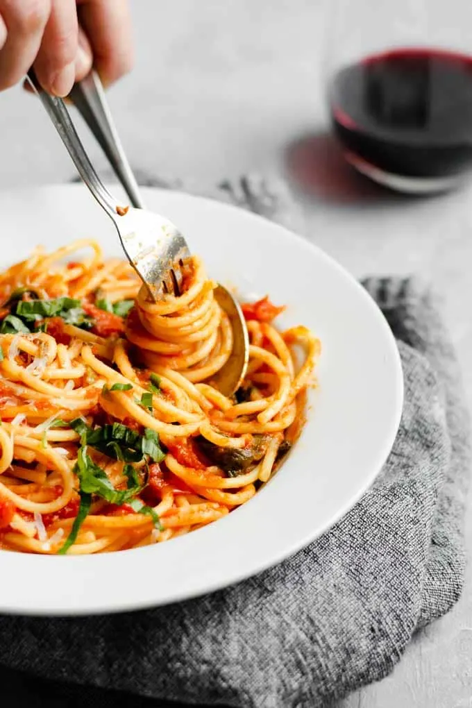 Classic homemade marinara, twirling spaghetti around a fork
