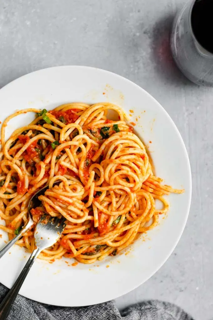 spaghetti with homemade marinara and sautéed spinach