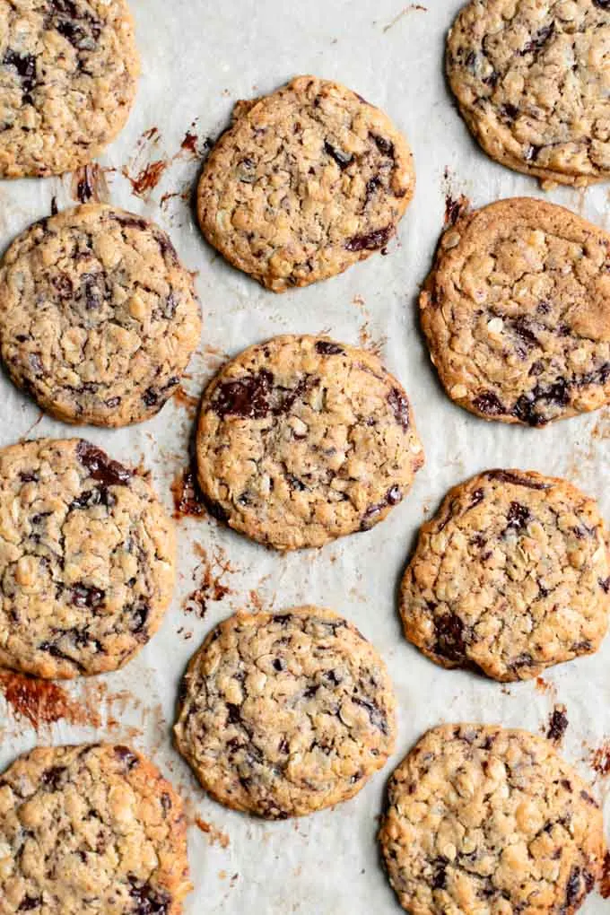 vegan peanut butter oatmeal chocolate chip cookies on baking tray