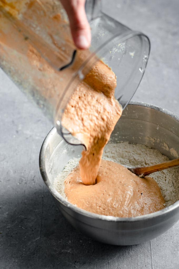 pouring the liquid mixture to the dry for making seitan