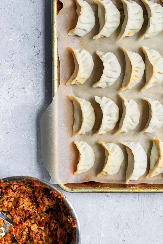 dumplings filled and shaped before cooking