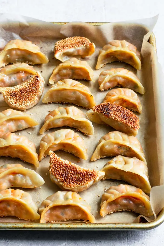 dumplings on a baking sheet after being cooked