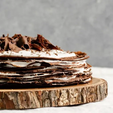 vegan dark chocolate crepe cake with a whiskey cream filling