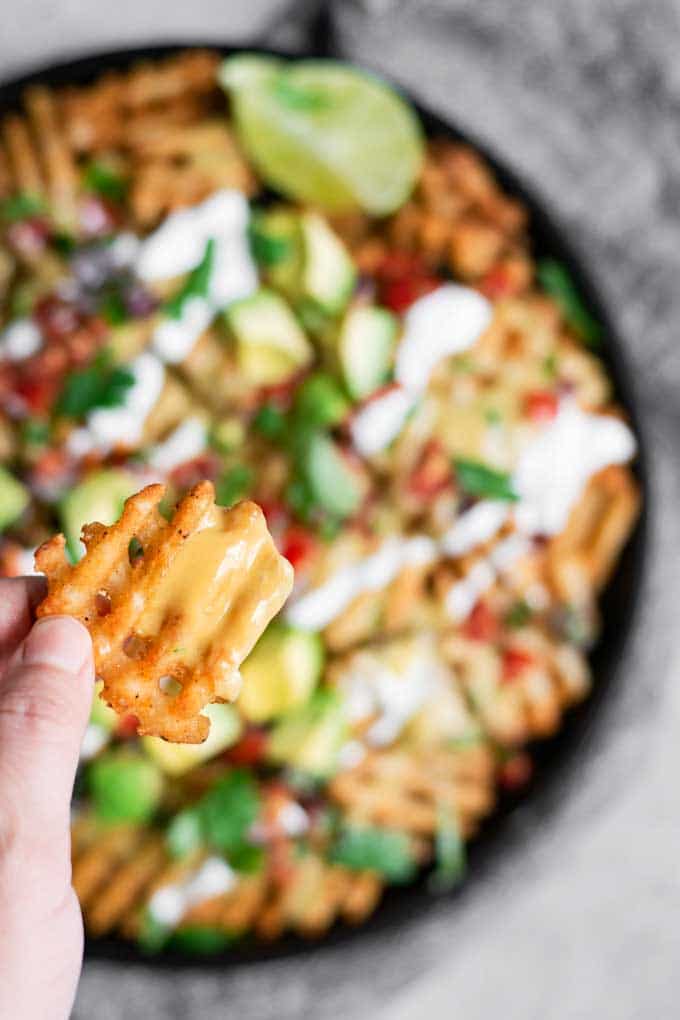 waffle fry smothered in vegan queso