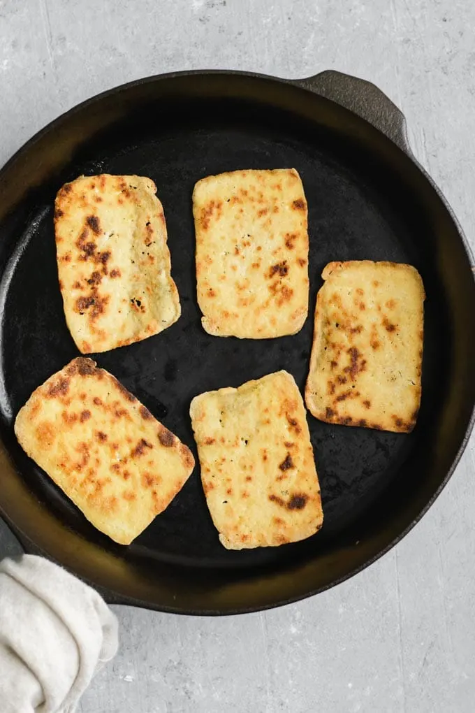 frying the thinly sliced tofu for the barbecue tofu