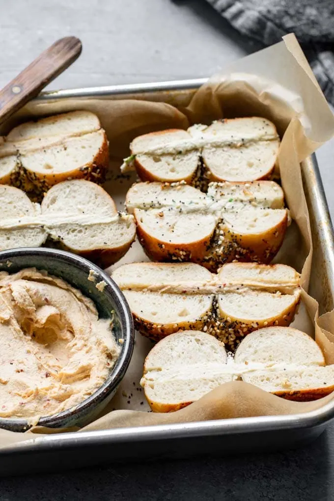 Bagels filled with vegan cultured cashew cream cheese and cut in half