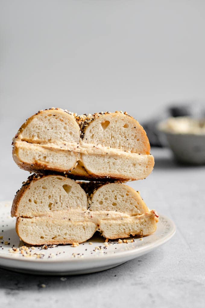 close up of a bagel filled with my homemade cultured cashew cream cheese