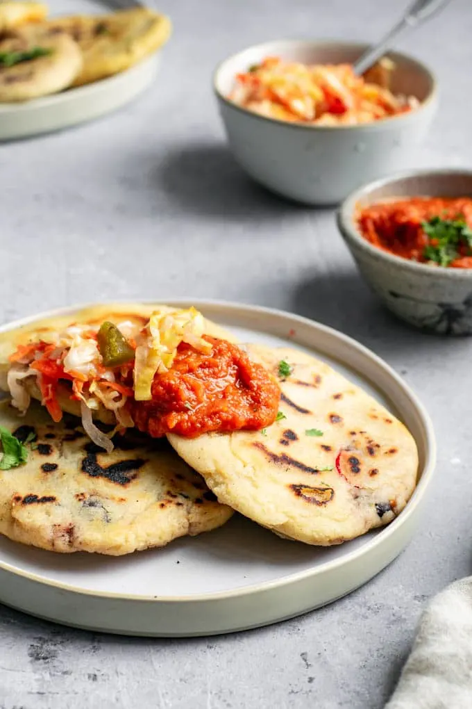 Salvadoran salsa roja served over pupusas and along with curtido