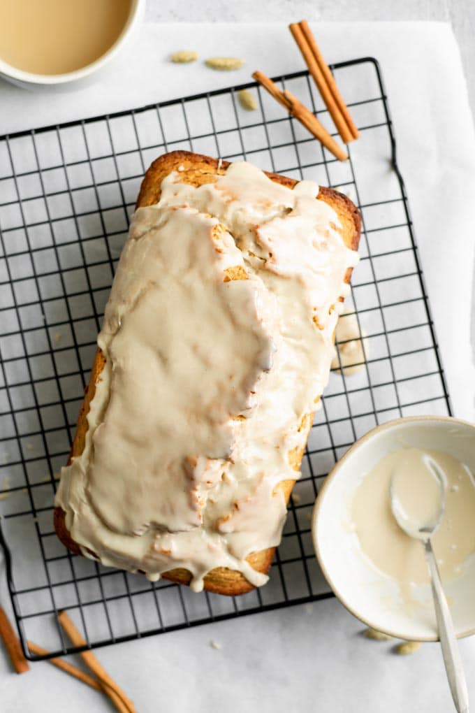 overhead view of the chai spice loaf cake being glazed