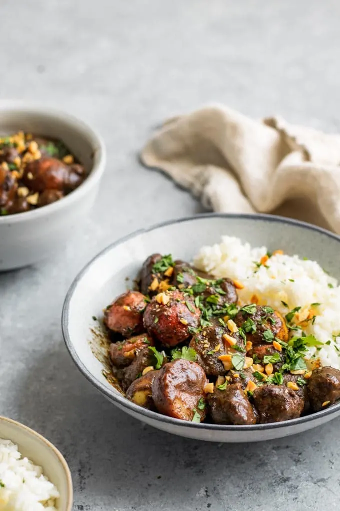 a side on view of the massaman curry with vegan beef