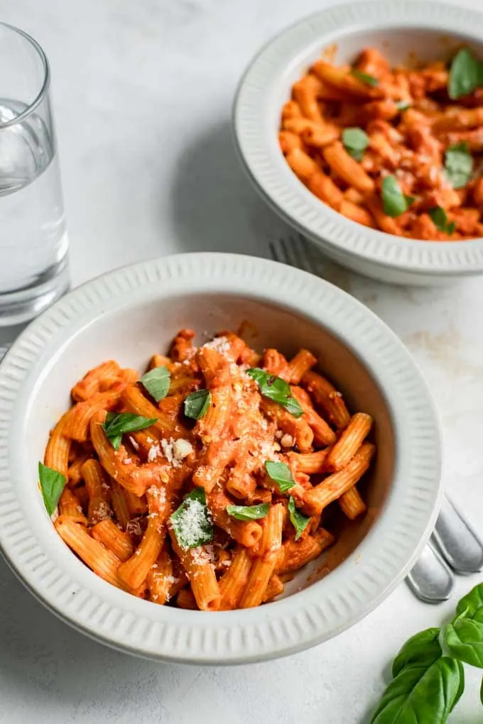 two bowls of pasta with vegan vodka sauce