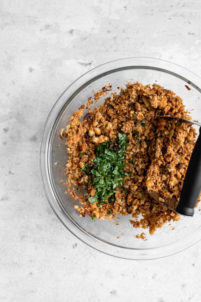 mashing up the herbed chickpea burger mixture, it shows the texture close to the final desired texture