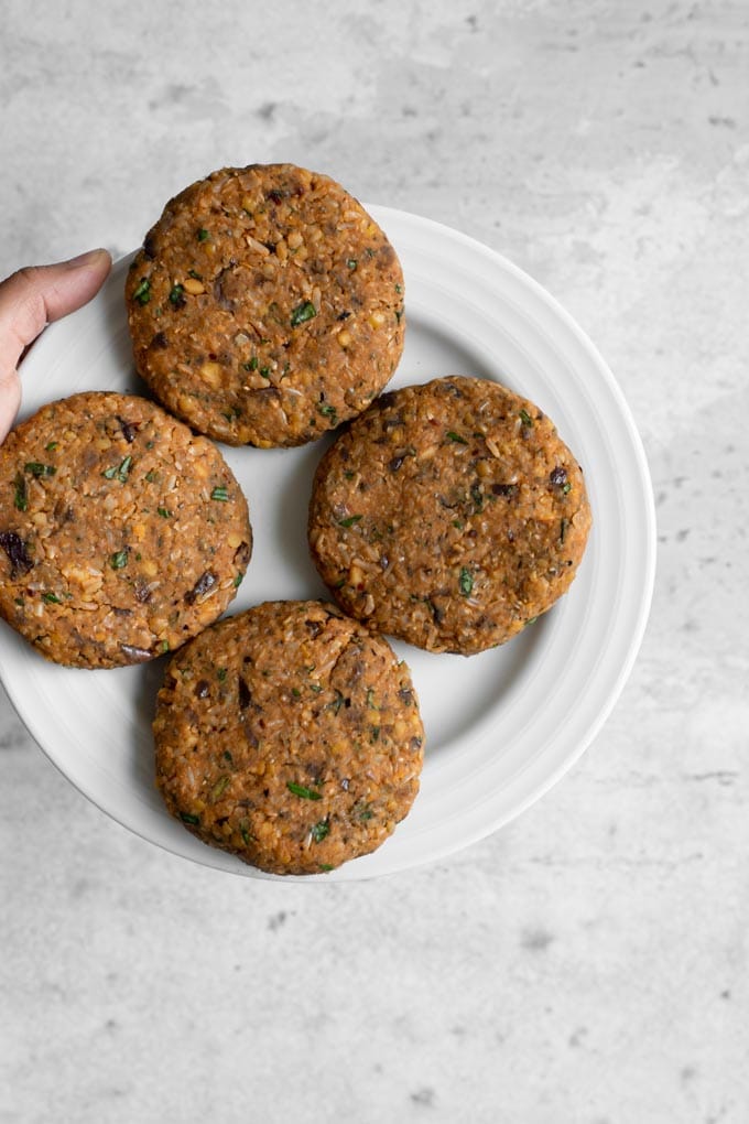 the herbed chickpea burger patties formed and ready to cook