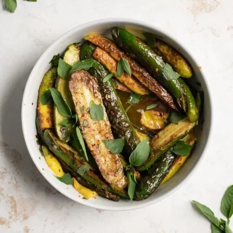 the marinated zucchini with extra fresh mint and thai basil to garnish