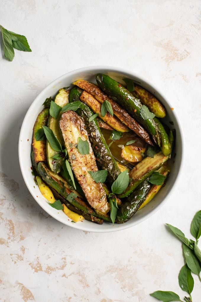 the marinated zucchini with extra fresh mint and thai basil to garnish