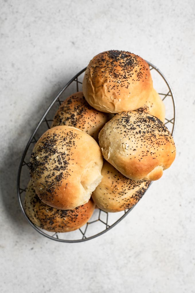 vegan milk bread buns in a basket