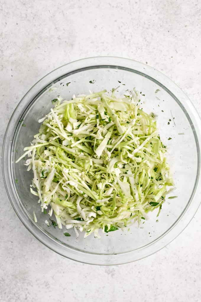 cabbage slaw in a glass bowl