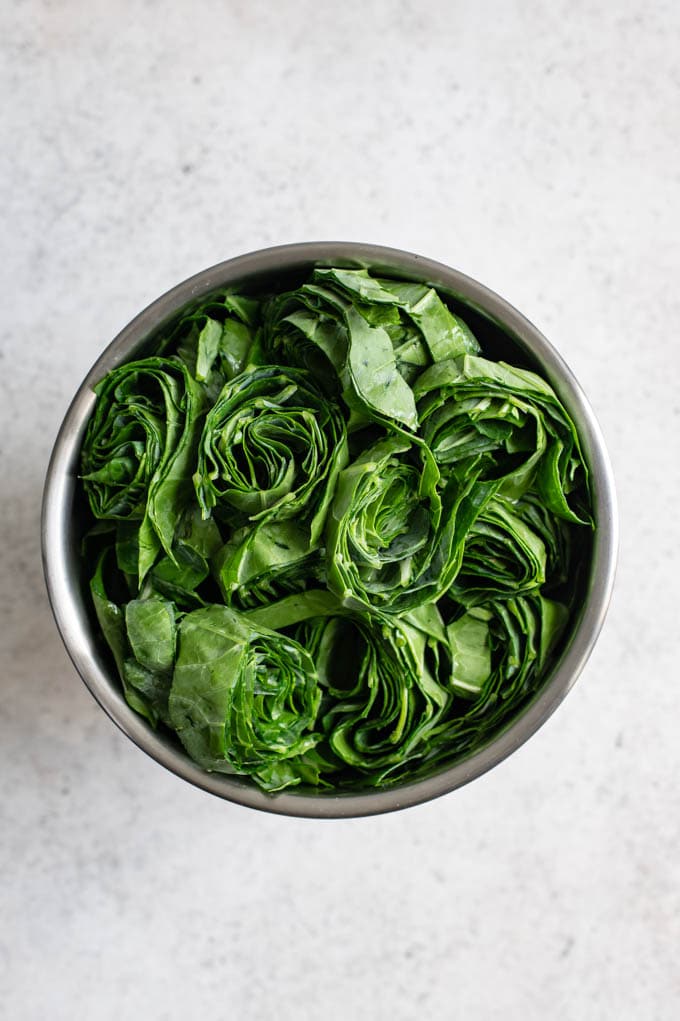 the ribboned collard greens, in a small mixing bowl before cooking