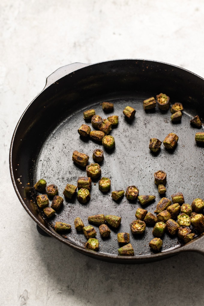 okra in the skillet once the spices have been added and it is done cooking