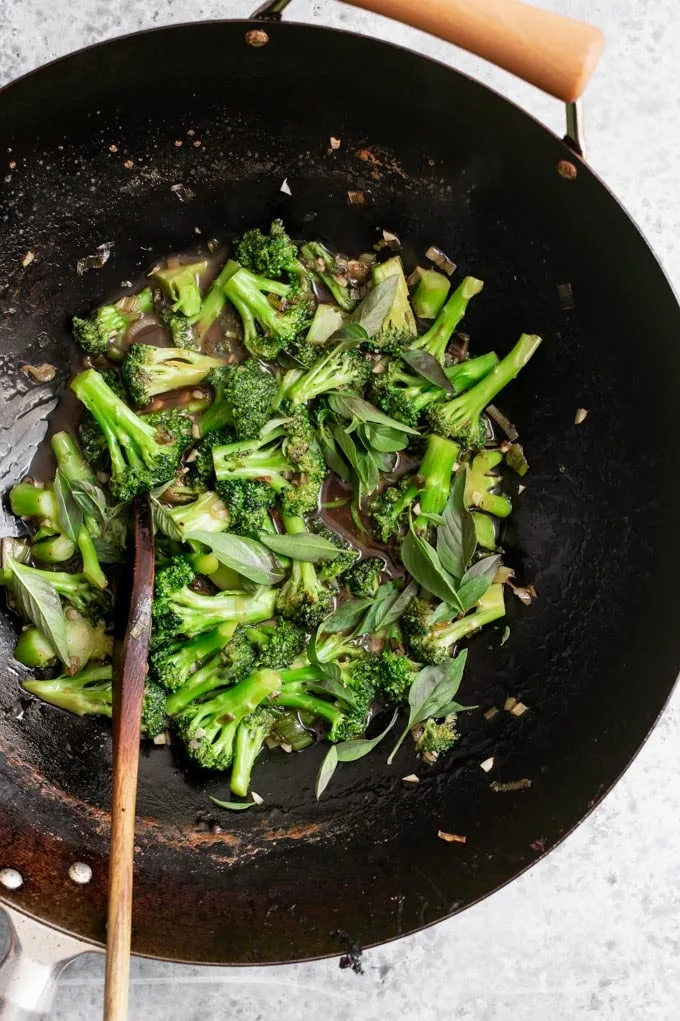 broccoli in garlic sauce cooking in the wok