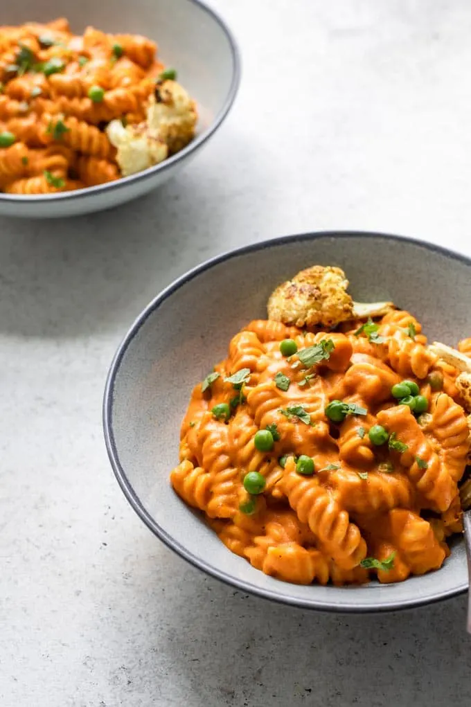 curry mac and cheese served with curry roasted cauliflower