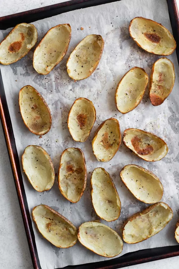 potato skins after baking for the second time, crispy and browned in places