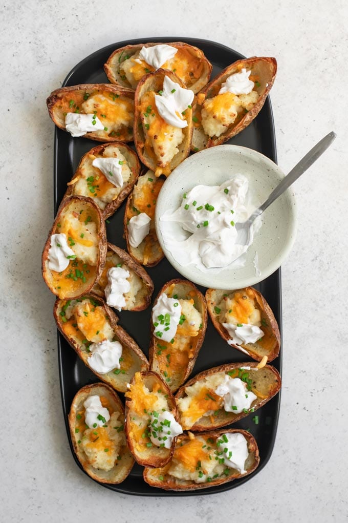 vegan baked potato skins served with vegan sour cream