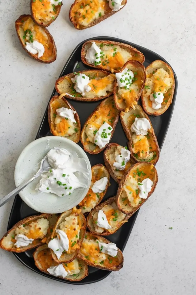 vegan baked potato skins served with sour cream
