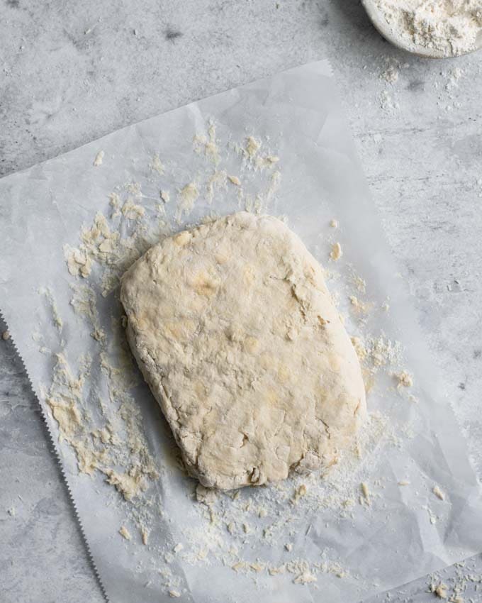 dough rolled out to 1-inch thick to cut into biscuits