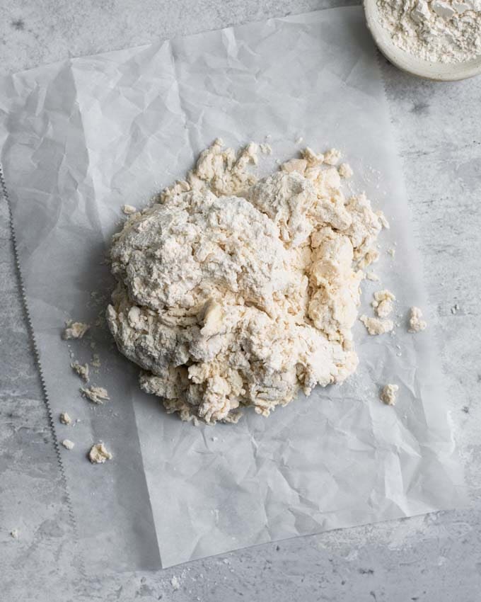 shaggy biscuit dough turned out onto counter