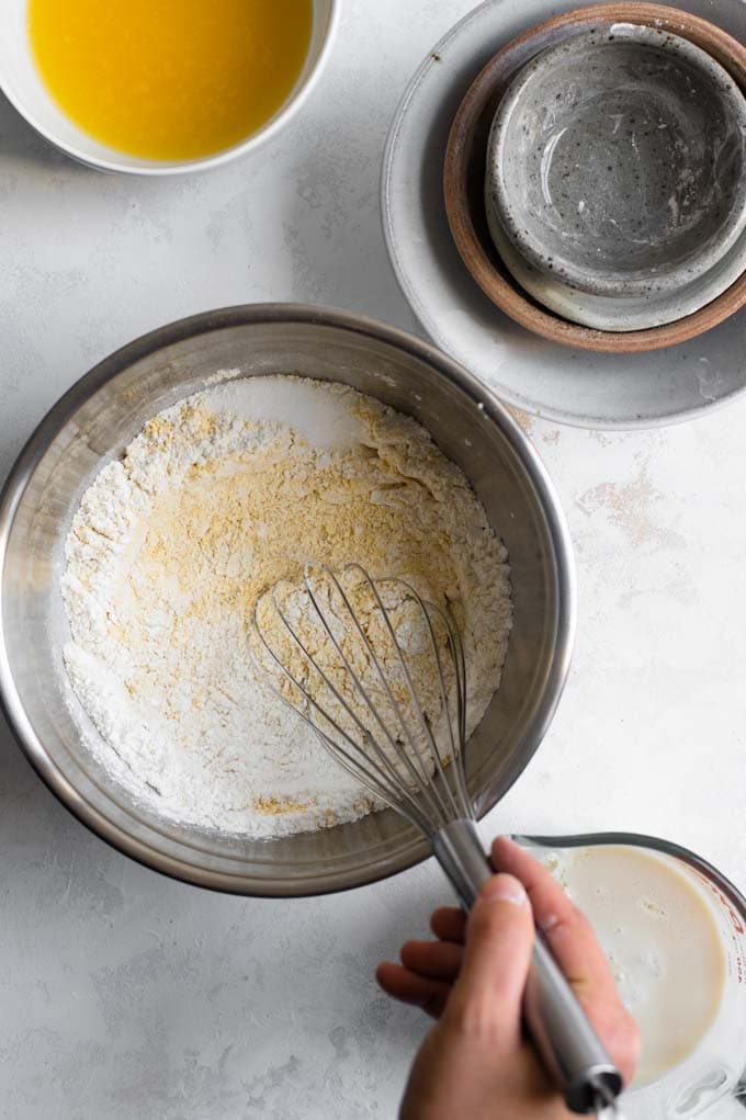 whisking dry ingredients together for vegan cornbread