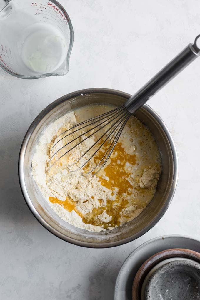 adding wet ingredients to dry to make vegan cornbread