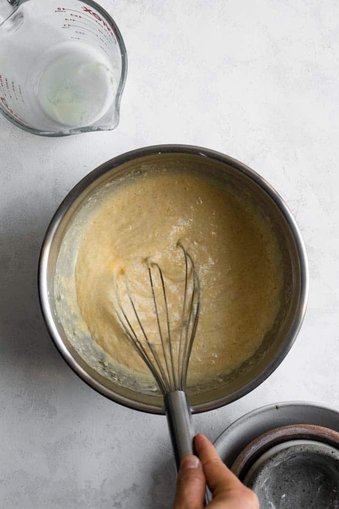 whisking the batter for vegan cornbread