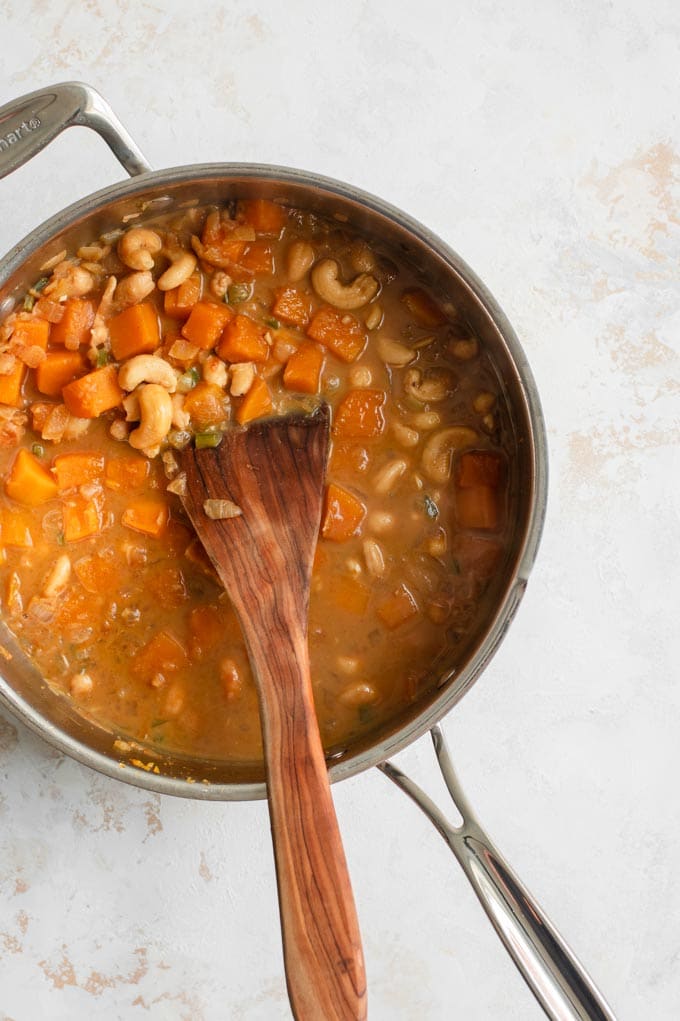 ingredients cooked and in the pot for butternut squash queso