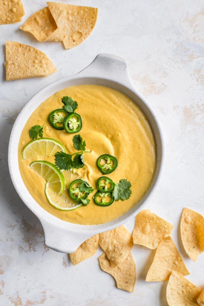 butternut squash queso topped with jalapeño, lime, and cilantro