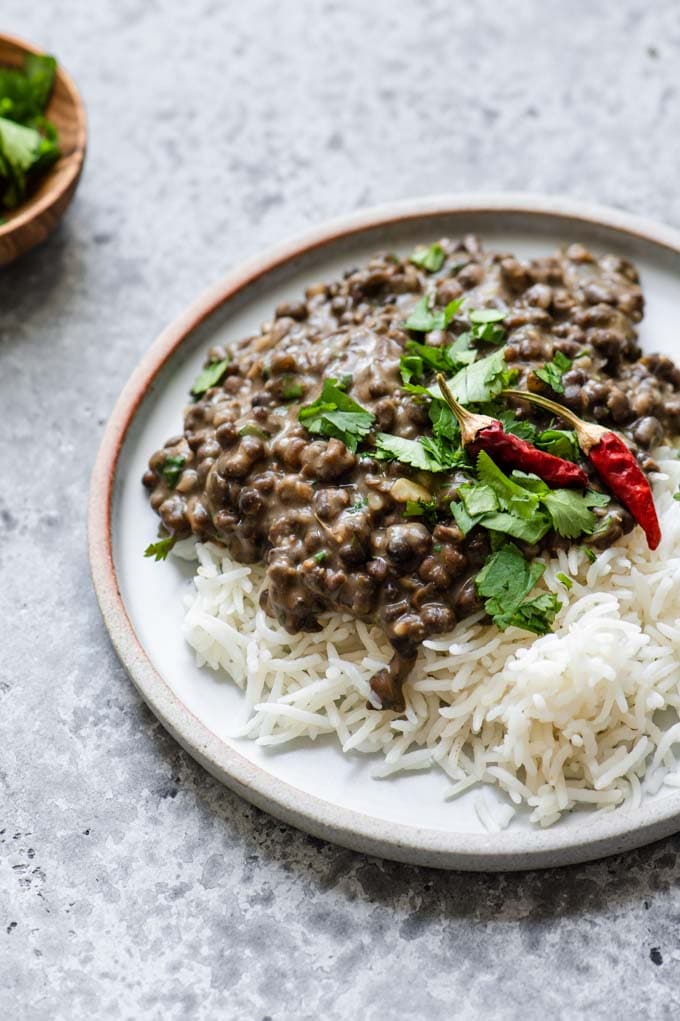 garlic dal fry and rice on a plate