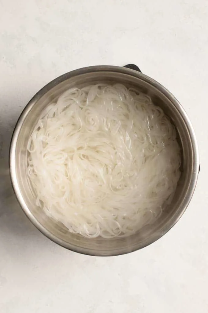 softened rice noodles in boiling water
