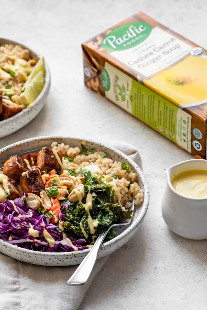 tofu buddha bowls with carrot ginger dressing and box of Pacific Foods soup used in the dressing