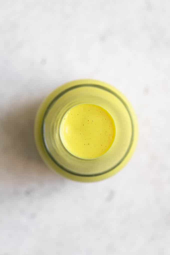 vegan hollandaise in a glass pourer