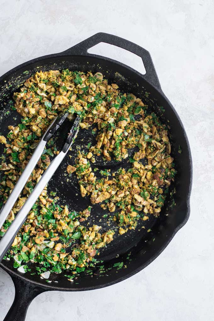 The walnut, garlic, parsley, and nutritional yeast mixture toasted in the skillet