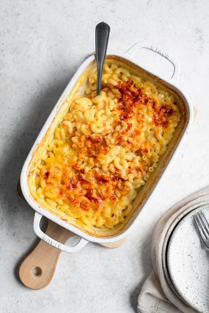 no boil mac and cheese in a white baking dish