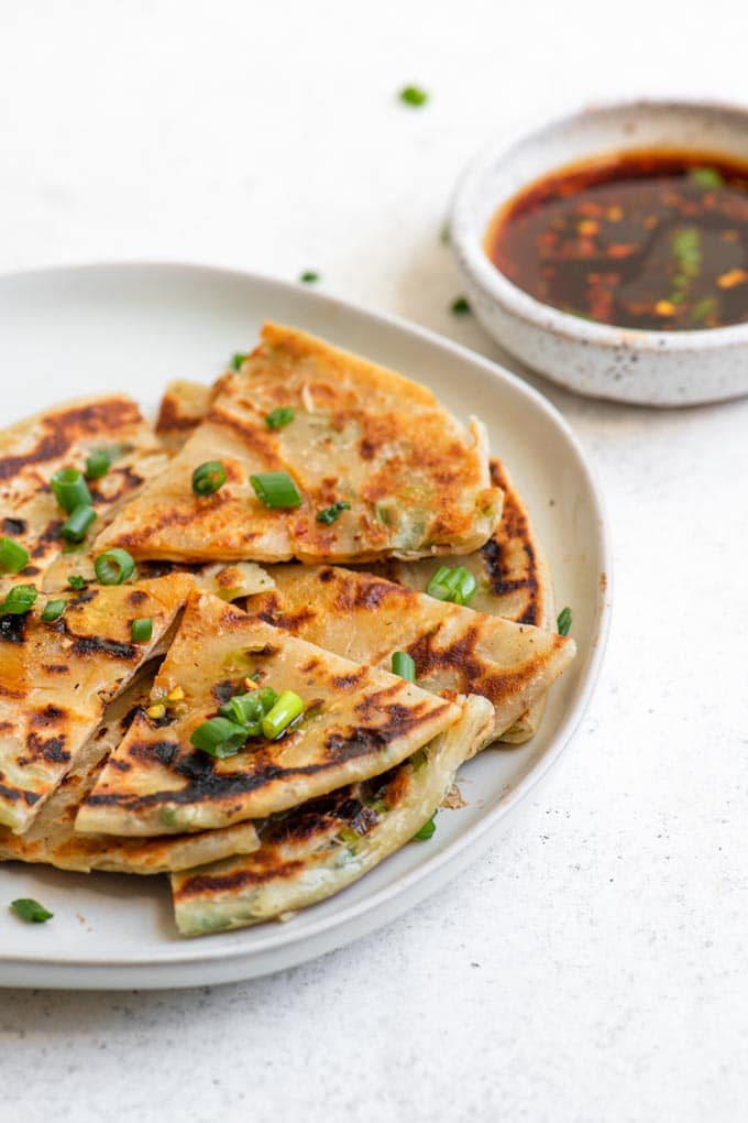 scallion pancakes topped with fresh scallion greens