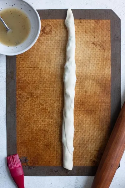 the rolled rope of dough