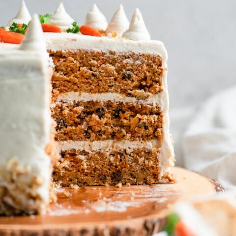 view of the inside of a 3 layer vegan carrot cake