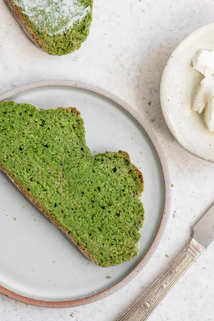 a slice of green bread on a plate