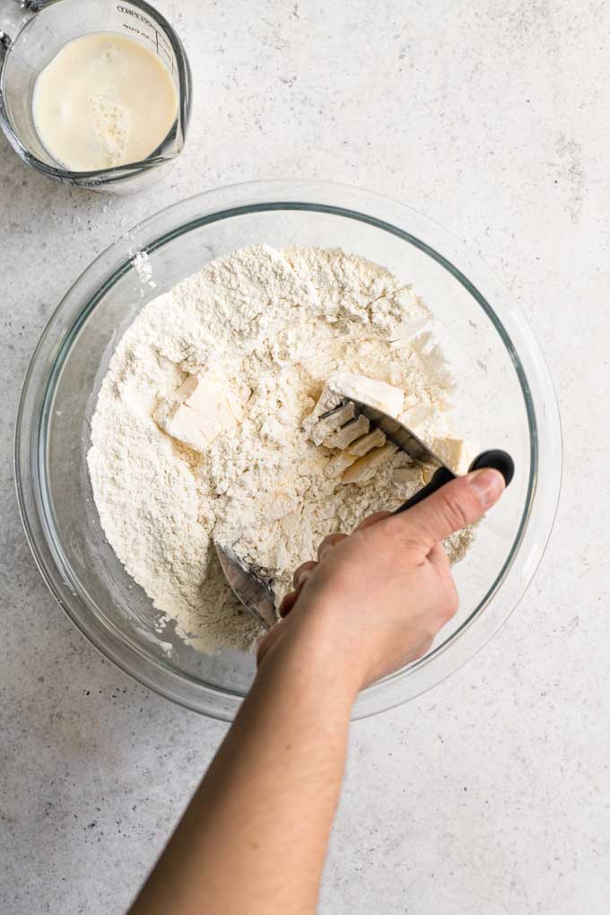 cutting vegan butter into flour
